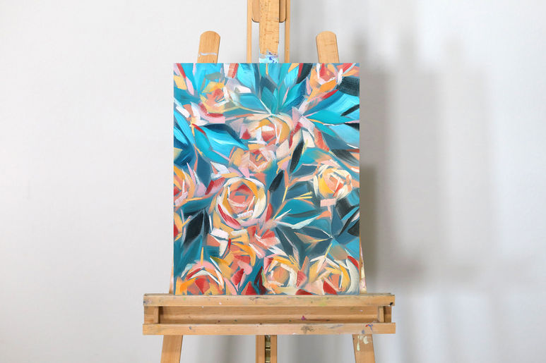 Yellow roses oil painting Winter Garden by Catherine Snowstorm on an easel. Abstract frozen window effect on teal background.