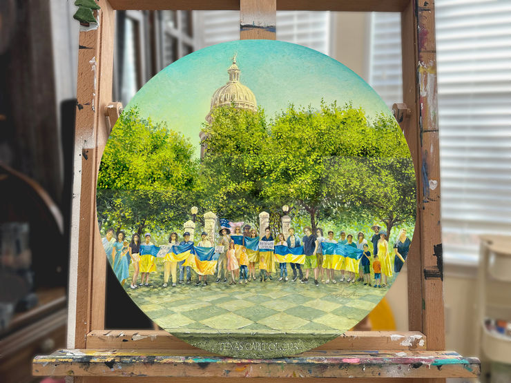 Tondo oil painting Keep it weekly by Catherine Snowstorm on a studio easel. Realistic scene of a Ukrainian solidarity rally in Austin, Texas.