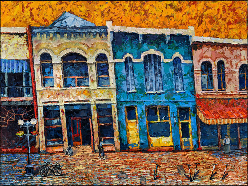 Textured impasto cityscape The Same Page by Catherine Snowstorm. Historic downtown street scene with vivid orange, yellow, and teal building facades.