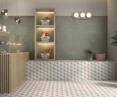 Interieur met keramische vloertegels in subtiel geometrisch patroon.