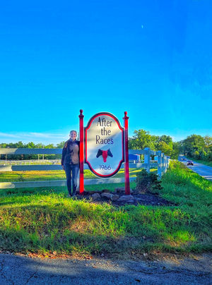 street sign for after the races