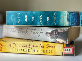 historical fiction novels stacked on each other