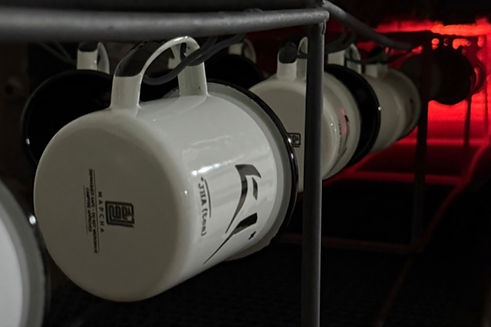 Custom Enamel Mugs In The Furnace_edited.jpg