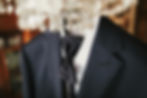 stylish black suit with white shirt and