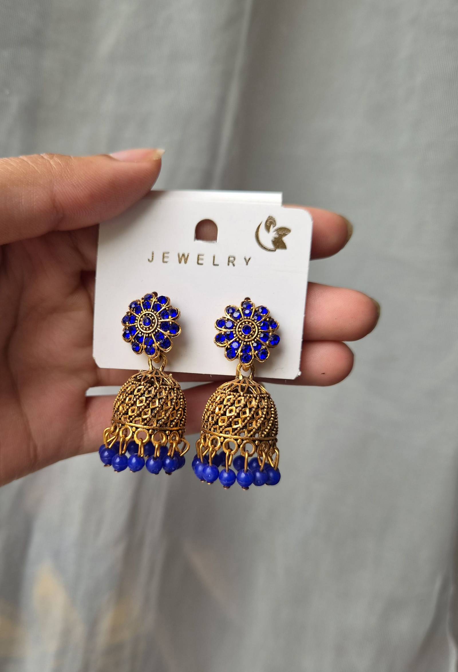 Boucles d'oreilles Jhumka dorées et bleues