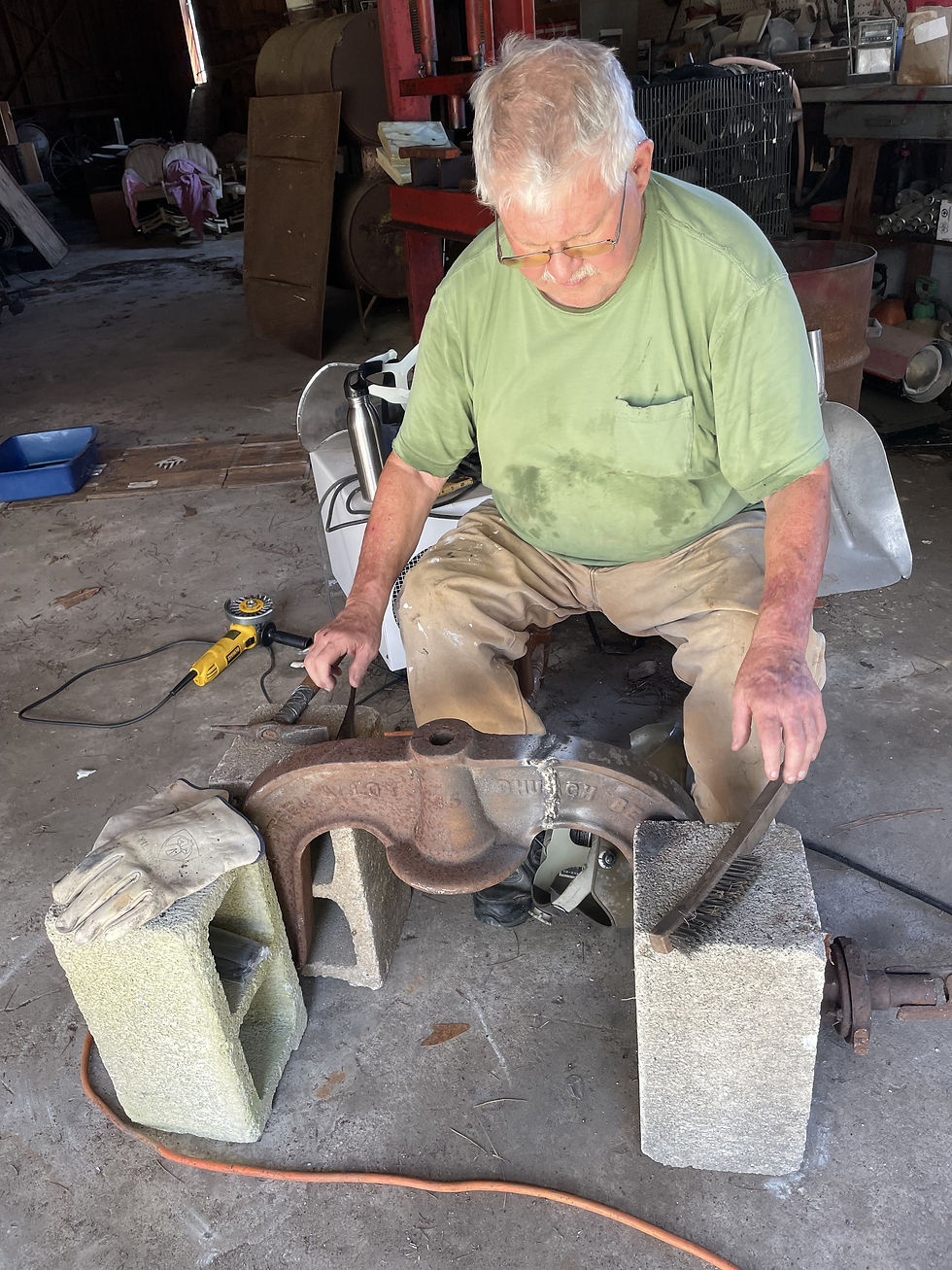 Doug Cahoon repairs the Bethany Bell