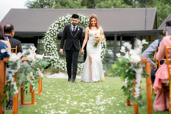 Outdoor wedding celebration decorated by grand story negombo at Water's Edge Colombo