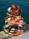 Seafood tower from Picú Seafood with lobster, shrimps and other food on the yacht in Puerto Banús