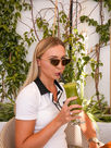 Woman drinking an amazing drink in Lalala Puerto Banús