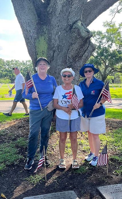 Putting flags on graves (1).jpg