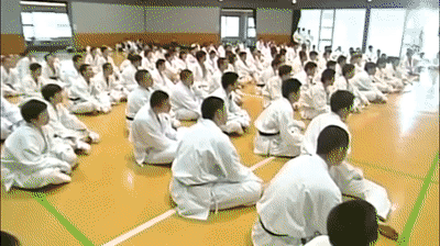 Nishimura_double_punch_jumping_back_kick