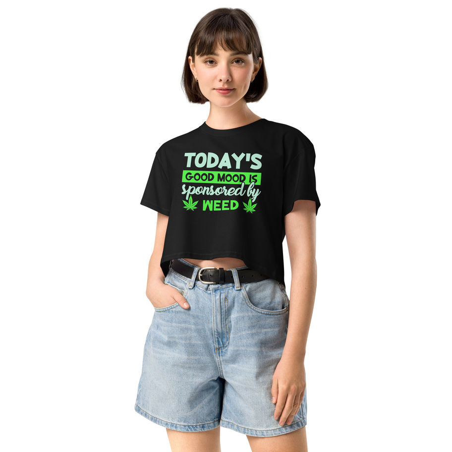 Black crop top with neon green text that says “Today’s Good Mood is Sponsored by Weed.”