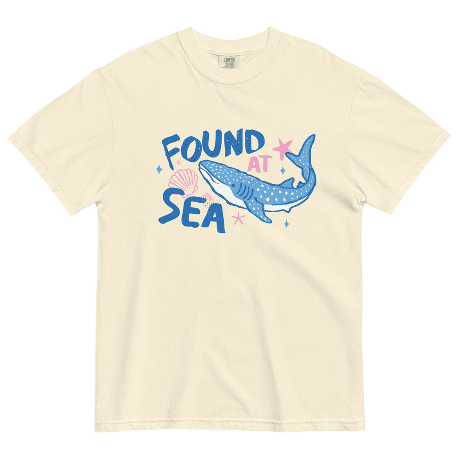 Found At Sea whale shark graphic t-shirt featuring a detailed ocean theme illustration with drifting sea stars and matching c