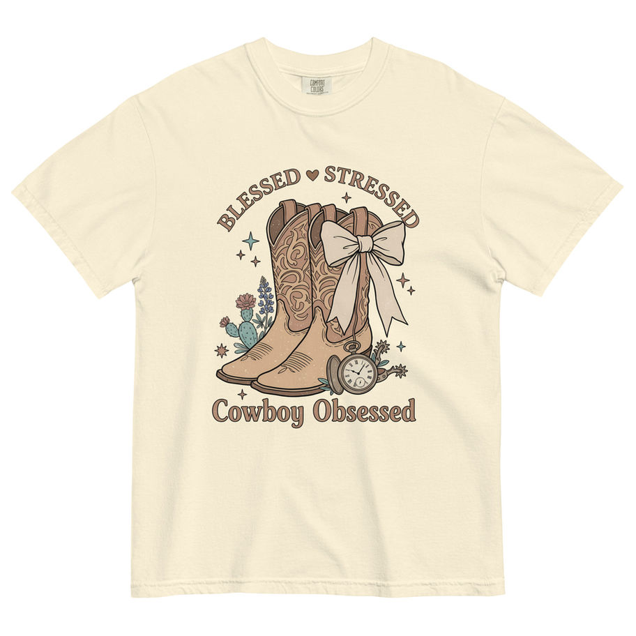 “Blessed Stressed Cowboy Obsessed graphic t-shirt in vintage black, featuring a detailed illustration of cowboy boots with a