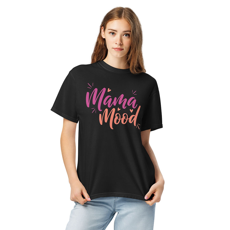 “Mama Mood graphic t-shirt in washed black, featuring a bold, vibrant retro typography design in wavy pink and orange letteri