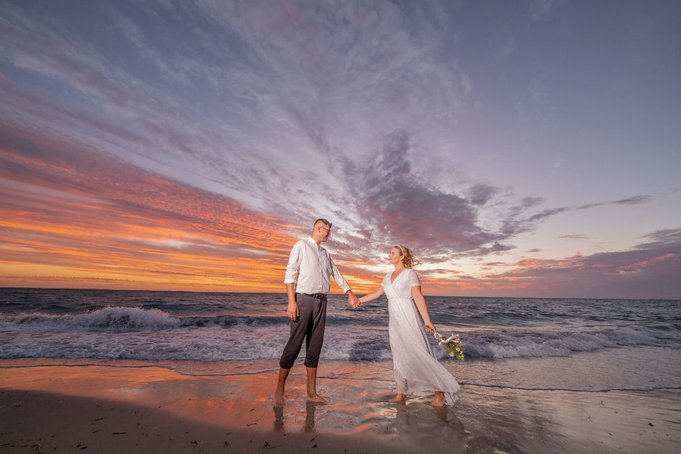 Small beach wedding in Perth with ocean view at sunset