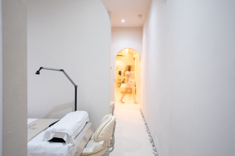 Arched doorway connecting the treatment rooms and reception at K’s Parlour