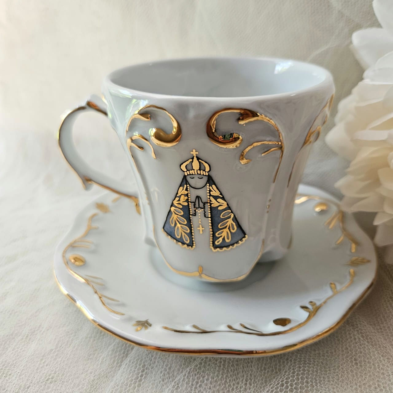 Xícara com pires Imagem Santa