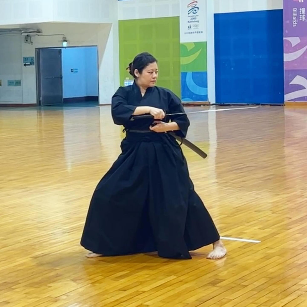 Mari - By day our diligent iaido practitioner, by night our chief entertainment officer!