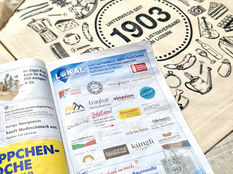 Wochenpass-Inserat und Stofftragtasche