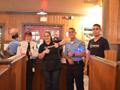 Local Law Enforcement Serves Customers at Q Smokehouse