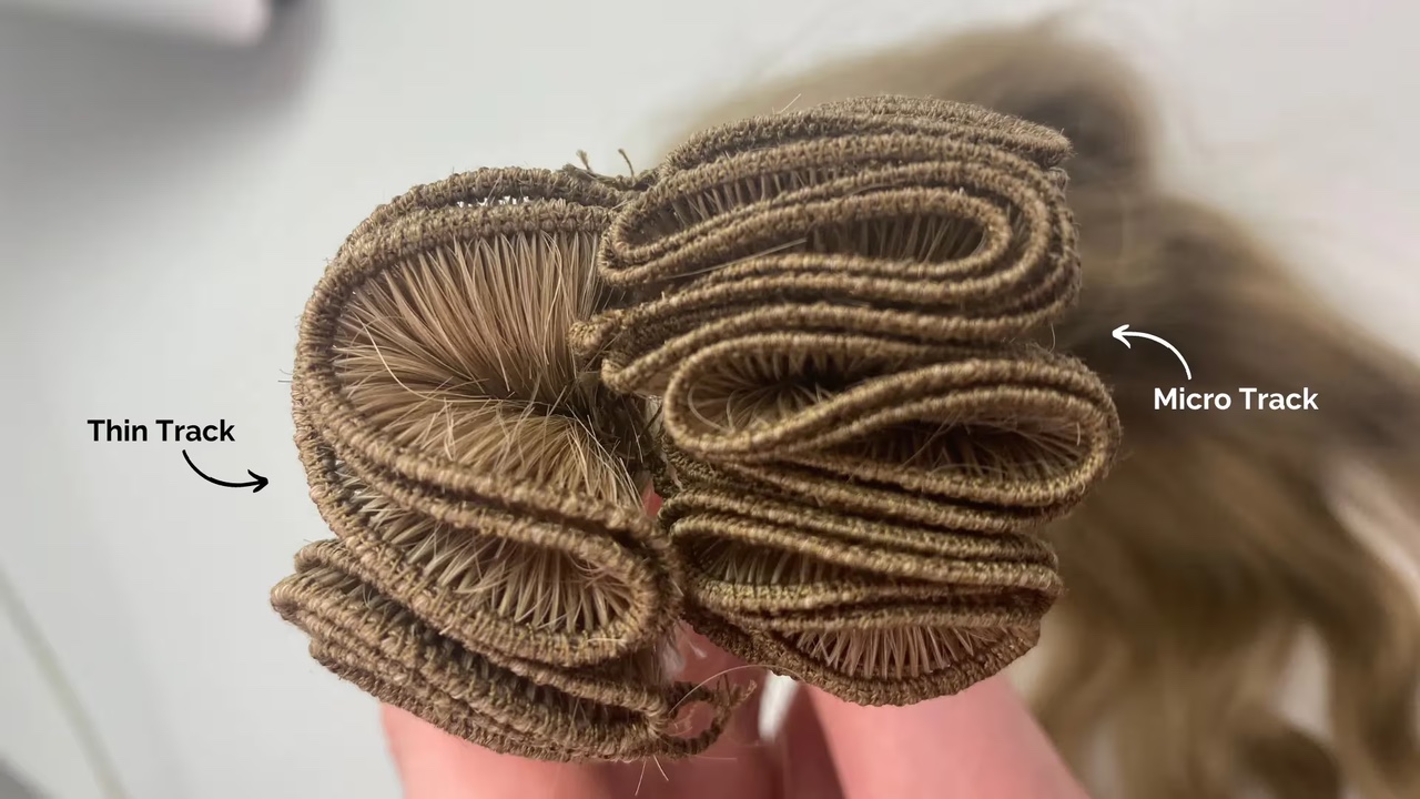 Side by side view of folded Gold Class hand-tied wefts showing the thickness comparison between Thin and Micro tracks, with arrows labelling each density for clarity.