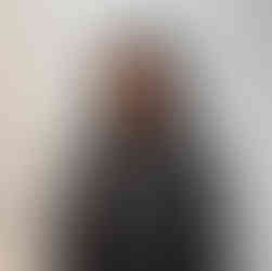 Before curly hair extensions showing natural curl texture prior to added length and volume