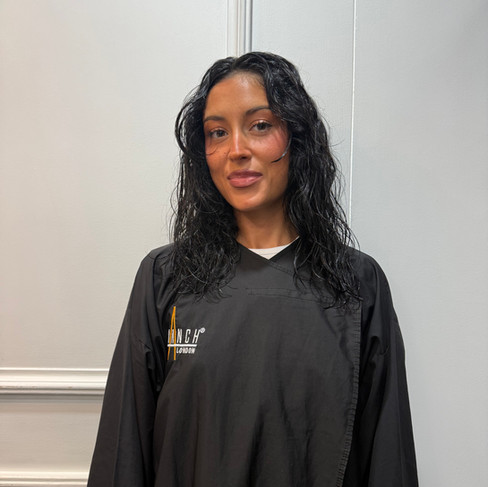 Before curly hair extensions showing natural curl texture prior to added length and volume