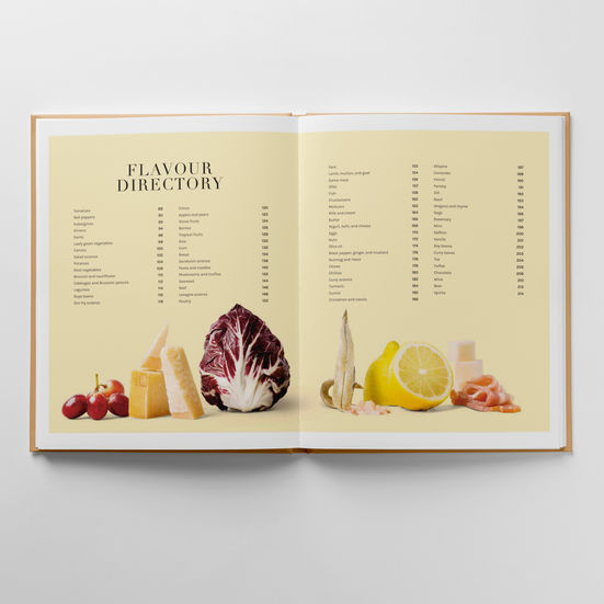 Still-life of various foods included in the Flavour Directory, including red grpes, parmesan cheese, radiccio, anchovy, salt, lemon, bacon and lard