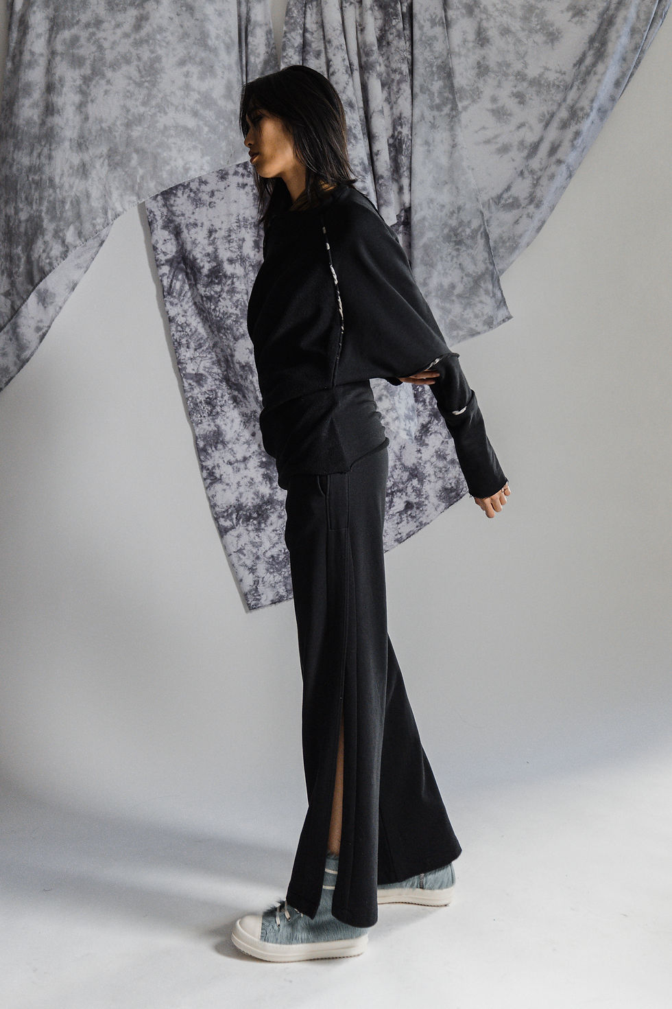 Thumbnail: TWISTED PULLOVER - LEFT SIDE POSE