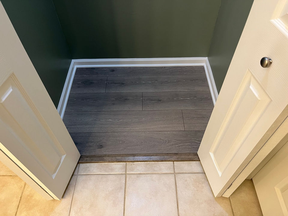 FINISHED: Repaired subfloor, new flooring, trim, bulkhead, doors, paint, ceiling light.