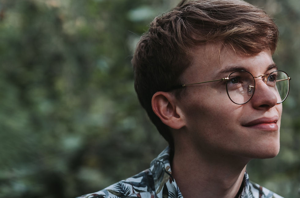 Man wearing designer glasses