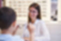Dispensing Optician helping patient choose glasses