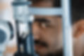 patient-or-customer-at-slit-lamp-at-opto