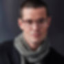 Man in a grey scarf wearing Bevel eyewear