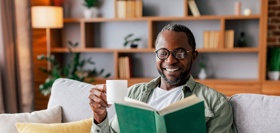 Man reading and wearing glasses