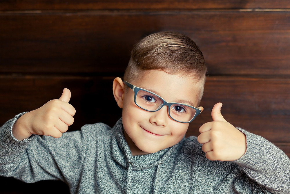 happy child wearing glasses