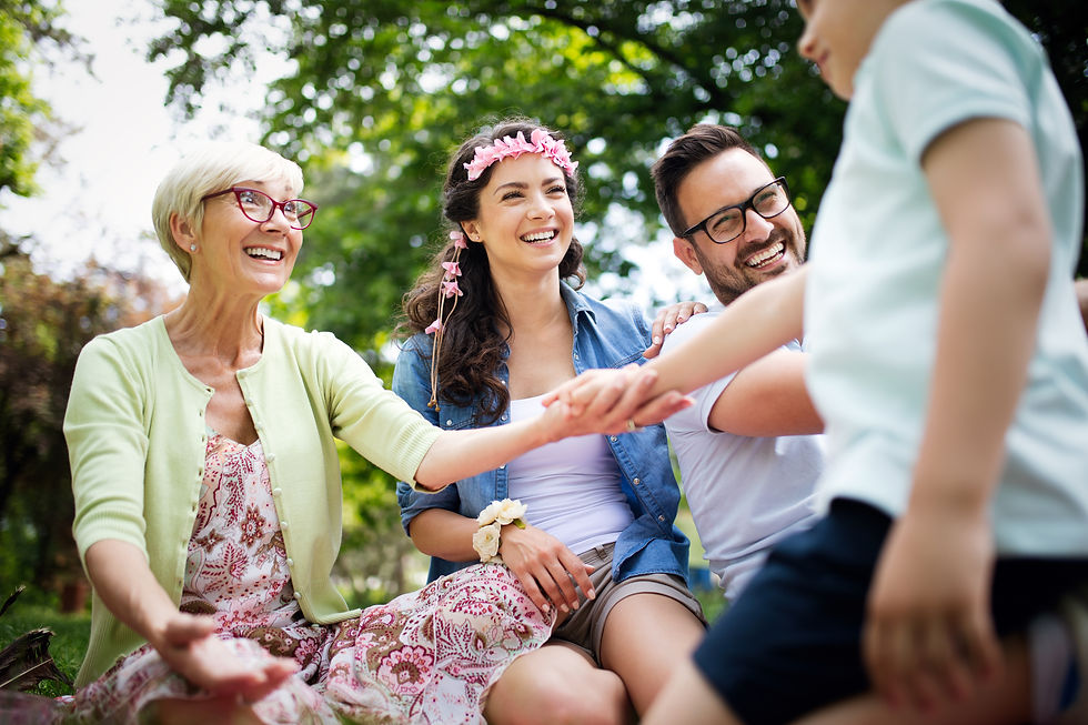 Family laughing and showing off new glasses