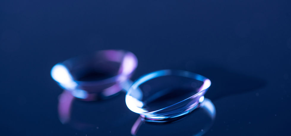 selective-focus-of-contact-lenses-arranged-on-blue-TPGXKFY.jpg