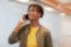 Man Talking on the phone wearing new designer glasses