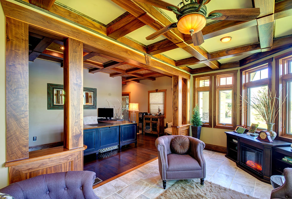 Residential home office featuring comfortable furnishings and a thoughtfully designed workspace.