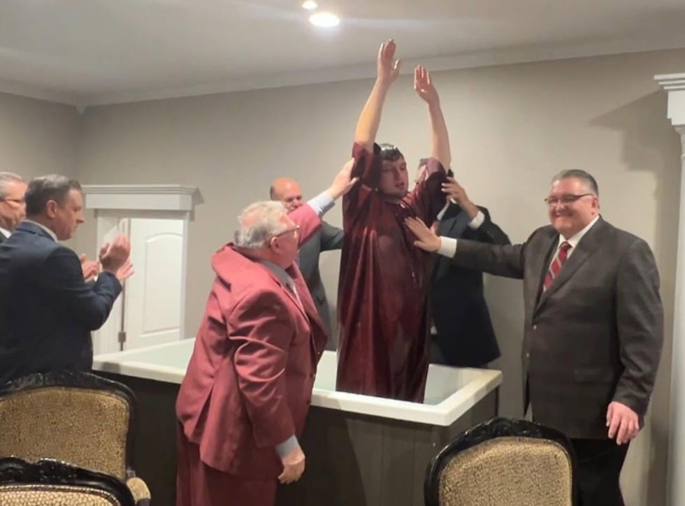 member being baptised