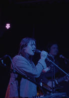 Kristina Westernik-Dandridge performing with The Infinite Daisy Chains live at Comet Ping Pong.