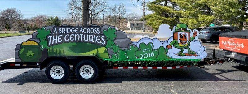 OOT Box Media's 2026 float for the Springfield, IL Saint Patrick's Day Parade, featuring float panels designed in-house 