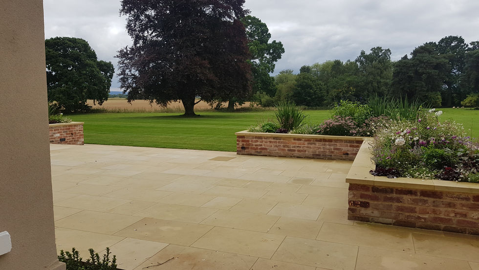 wedding venue, burtonfields hall, landscape design, planting design, yorkstone, redbrick, yorkshire, herbaceous planting, country house, Edwardian house, garden terrace, terrace, views, beech tree, estate