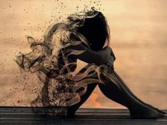 A solitary figure sitting with grief on a dock by the water at sunset, blending into the ethereal atmosphere, as part of their form appears to dissolve into the air.