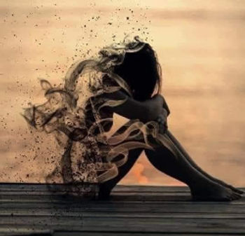 sorrowful girl at sunset