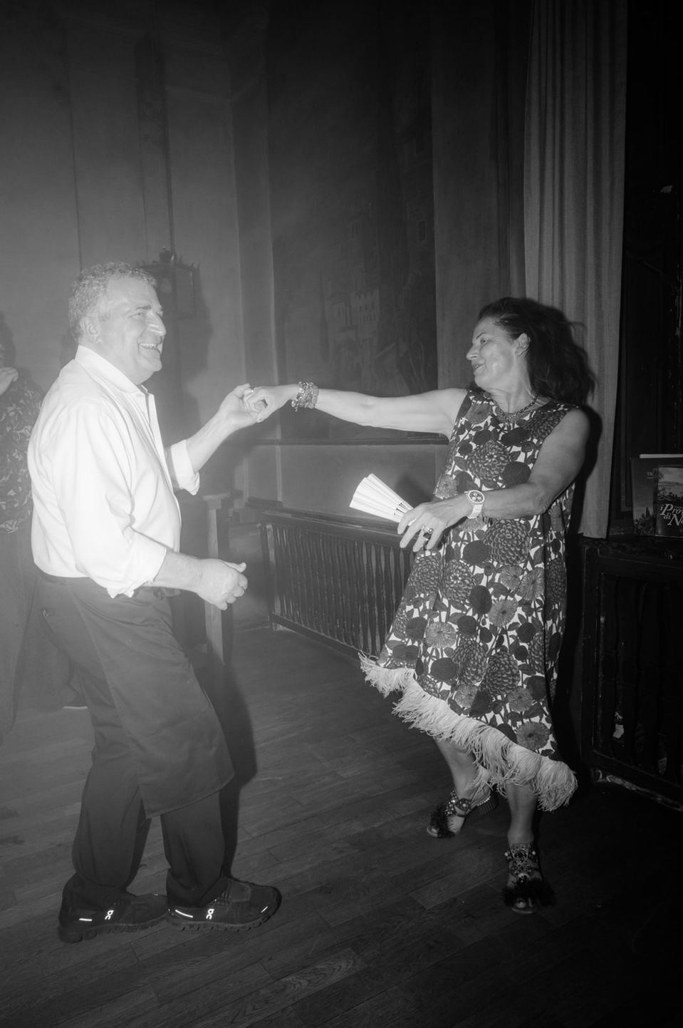 guest-dancing-with-service-personal-at-a-wedding-party