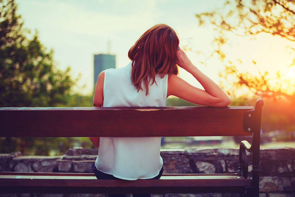 a woman sitting on the bench