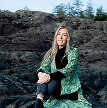 Candice sitting on the beach.jpg